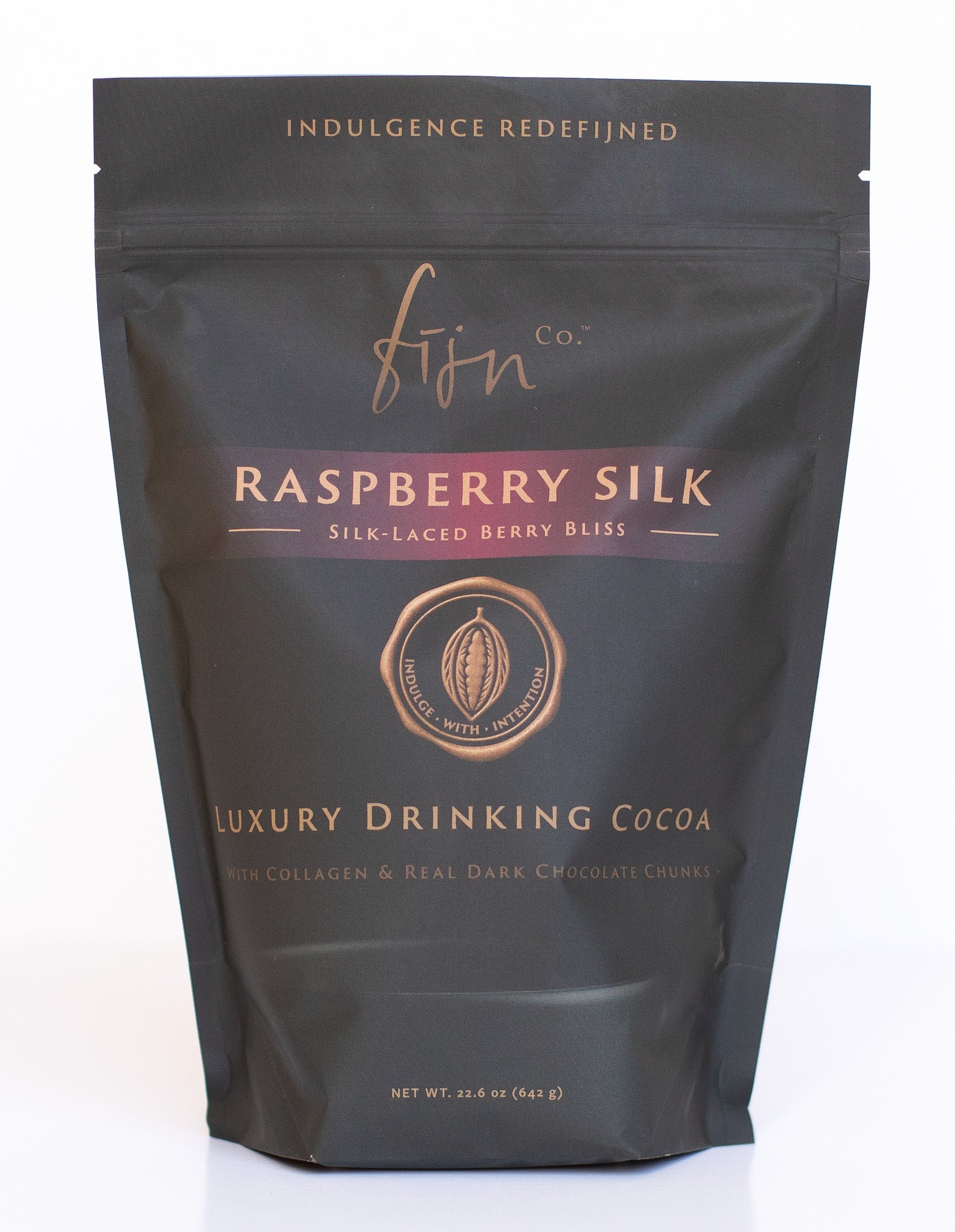 Dark packaging of 'Raspberry Silk' luxury drinking cocoa on a white background
