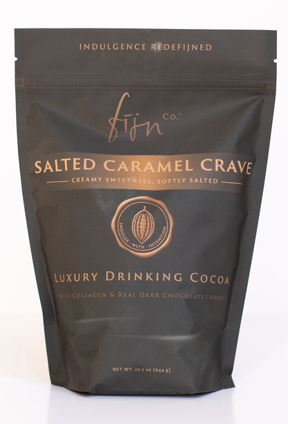 Dark packaging of 'Salted Caramel Crave' luxury drinking cocoa with gold text on a white background.